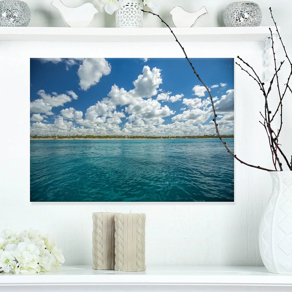 DESIGN ART Designart "White Fluffy Clouds Over Sea" Oversized Beach Canvas Artwork 20 in. wide x 12 in. high