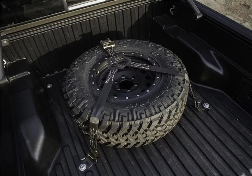 N-Fab by RealTruck Bed Mounted Rapid Strap Tire Carrier With Dark Strap | Gloss Ebony | Bm1Tsbk | Universal Fit