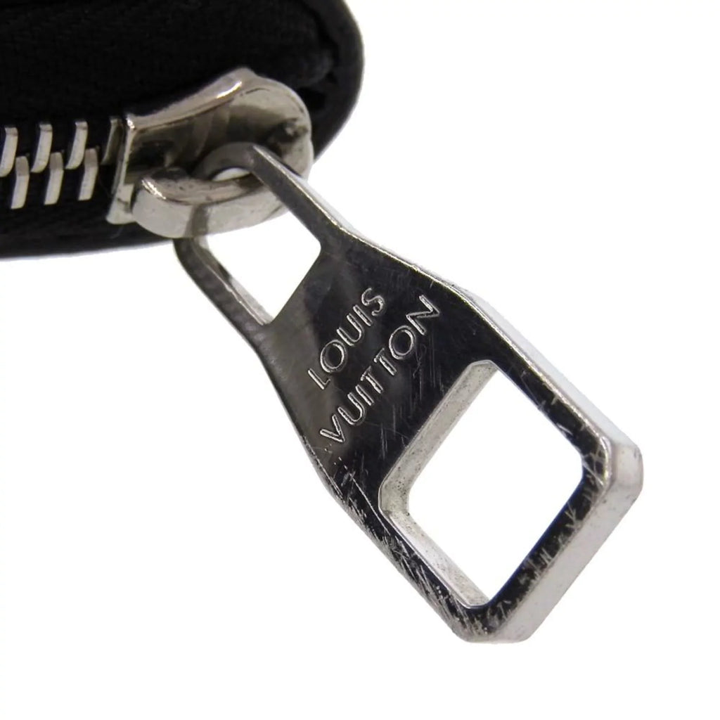 Pre-Owned Louis Vuitton LOUIS VUITTON Taiga Zippy Wallet Vertical Round Zipper Long Noir M30503 (Good)