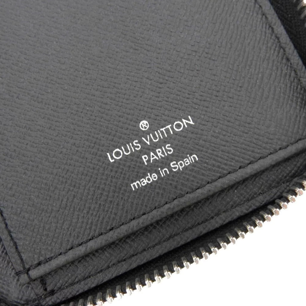 Pre-Owned Louis Vuitton LOUIS VUITTON Taiga Zippy Wallet Vertical Round Zipper Long Noir M30503 (Good)